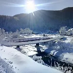 під горою *